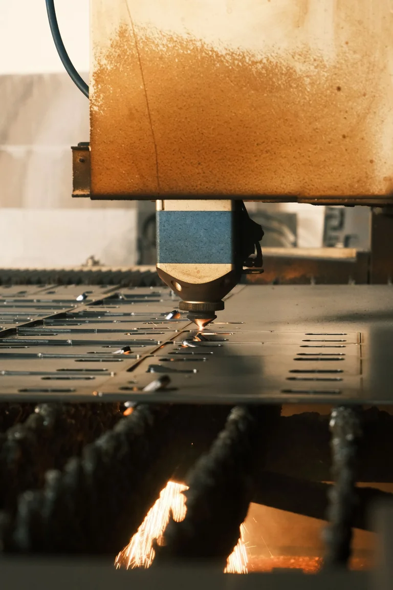 Laser cutting parts from a metal sheet